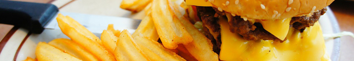 Eating Burger at Rumbi Island Grill restaurant in Sandy, UT.